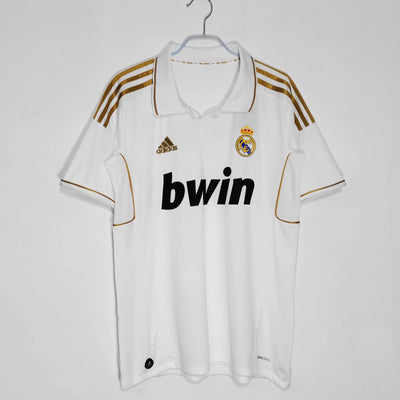 a soccer jersey hanging on a hanger