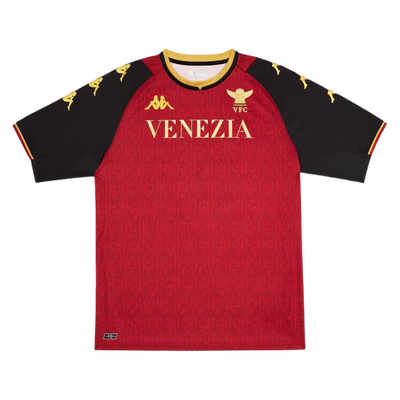 a red and black soccer jersey with the word venezuela on it