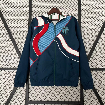 a blue jacket with a red, white, and blue design on it