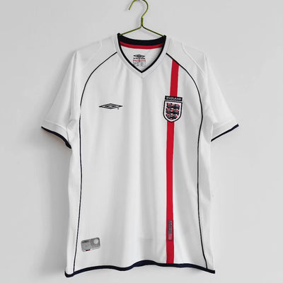 a soccer jersey hanging on a hanger