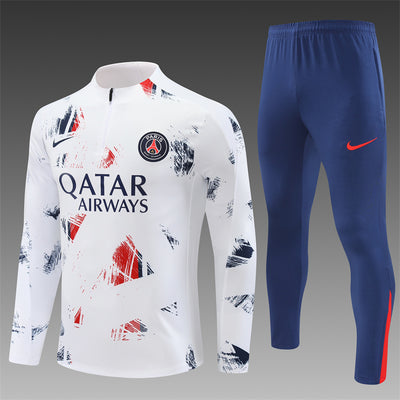 a white and blue soccer jersey and pants