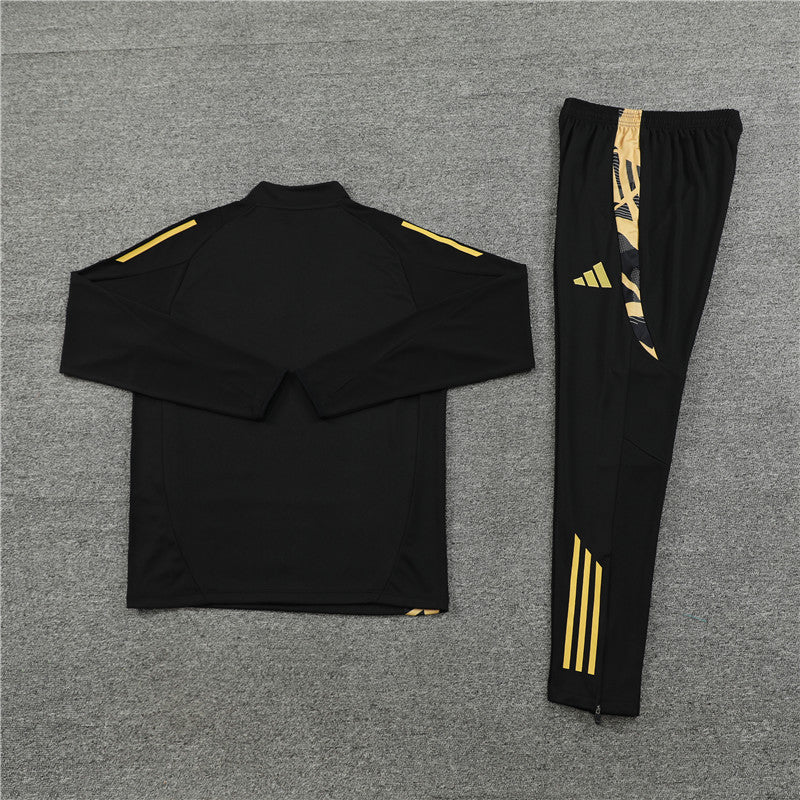 a black and gold tracksuit with matching pants