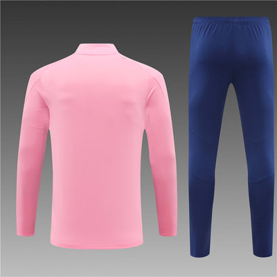 a pink and a blue soccer uniform