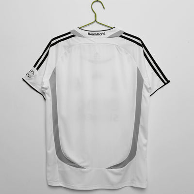 a soccer jersey hanging on a hanger