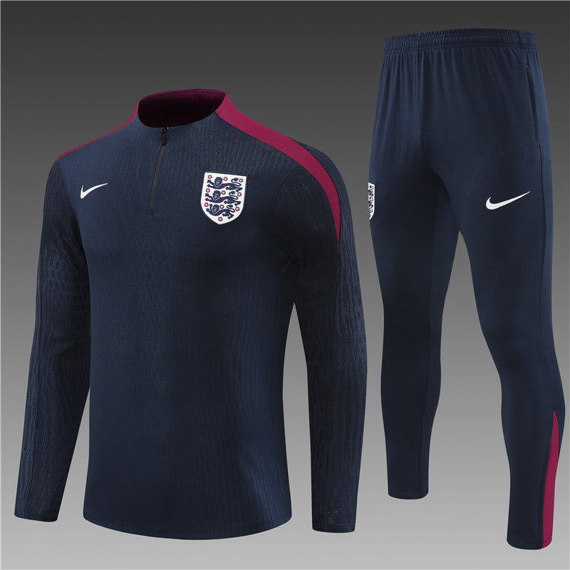 a soccer uniform with the england crest on it