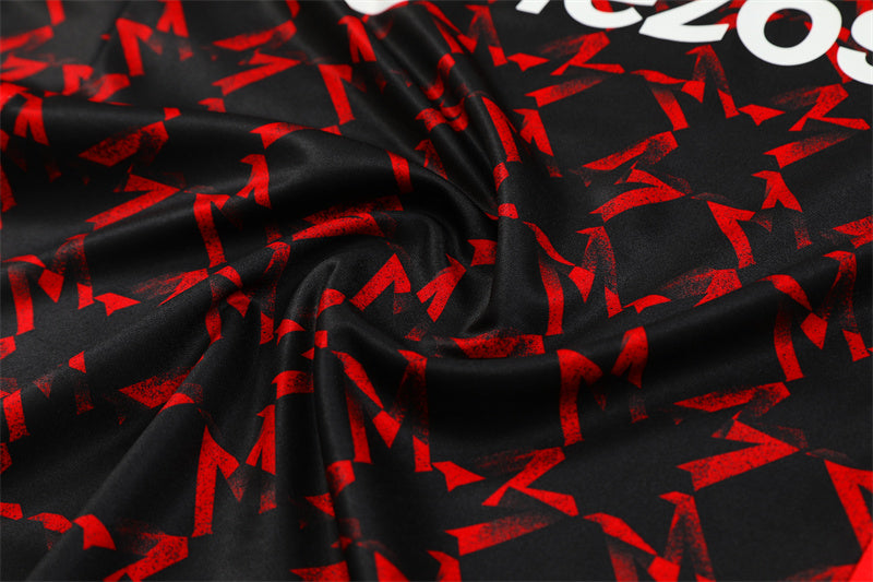 a close up of a red and black fabric