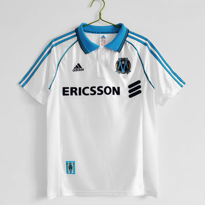 a soccer jersey hanging on a hanger