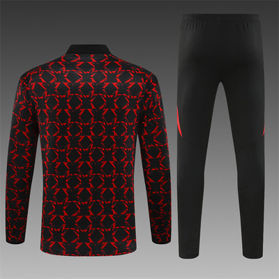 a man's black and red tracksuit and pants