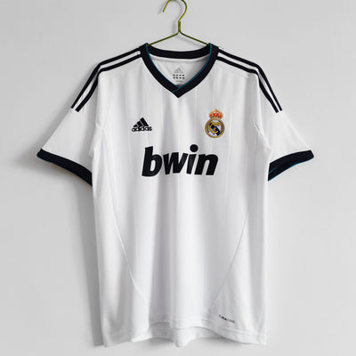 a soccer jersey hanging on a hanger