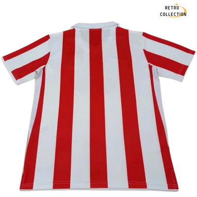 a red and white striped t - shirt