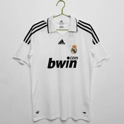 a soccer jersey hanging on a hanger