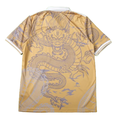 a yellow shirt with a dragon on it