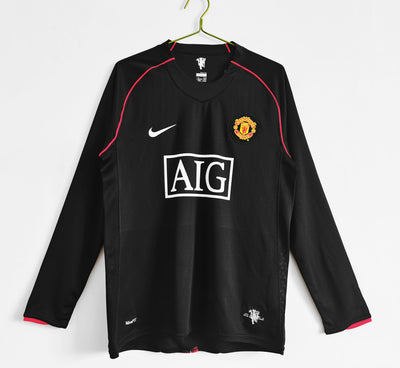 a soccer jersey hanging on a hanger