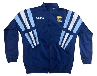 a blue adidas jacket with white stripes