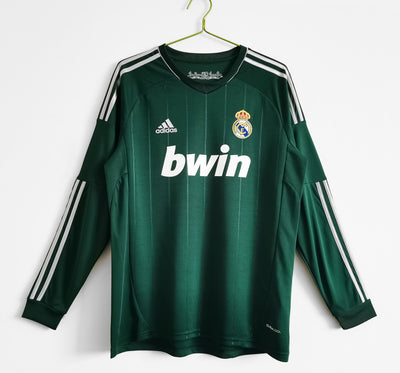 a soccer jersey hanging on a hanger