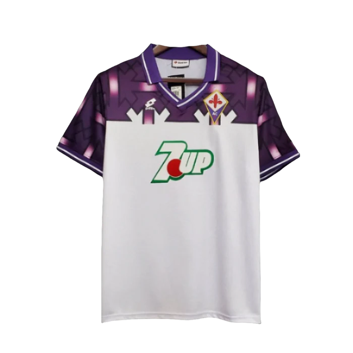 a purple and white soccer jersey with the word zup on it