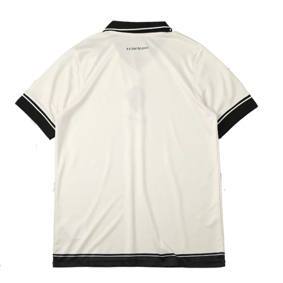 a white t - shirt with black trims