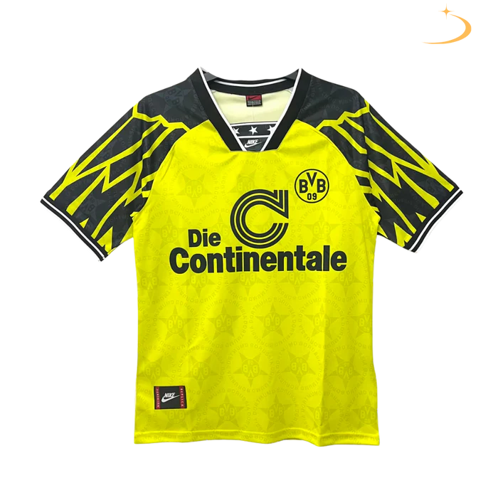 a yellow and black soccer jersey with the words die continentale on it