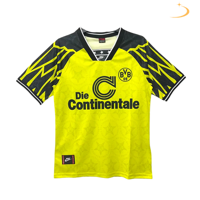 a yellow and black soccer jersey with the words die continentale on it