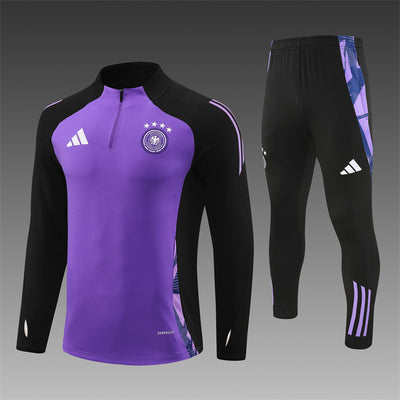 a purple and black soccer uniform is shown