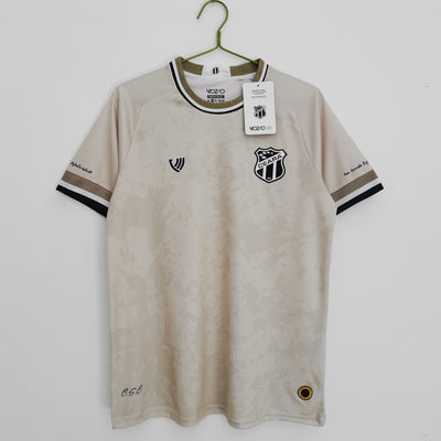 a soccer jersey hanging on a hanger