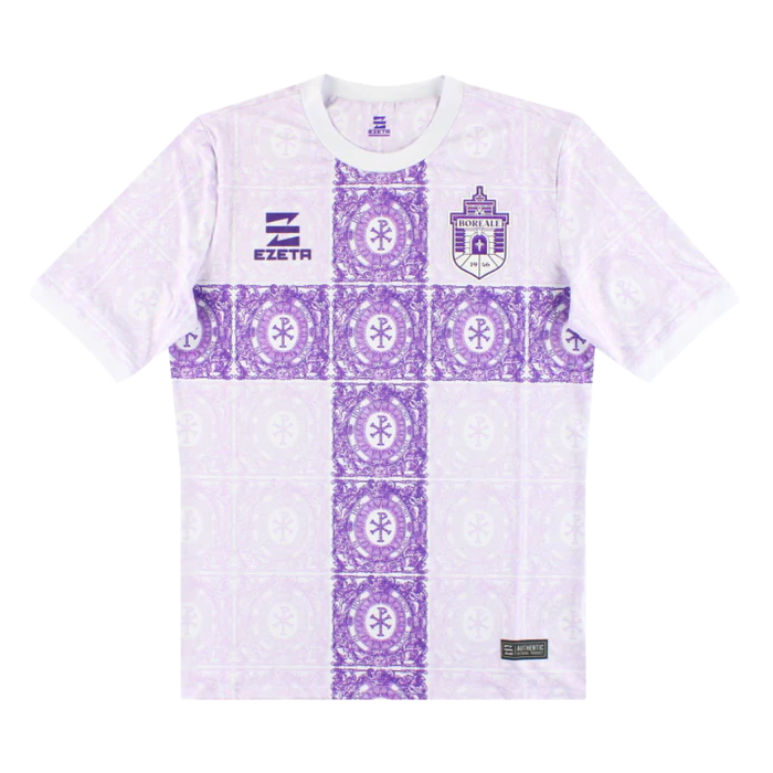 a purple and white t - shirt with a cross on it