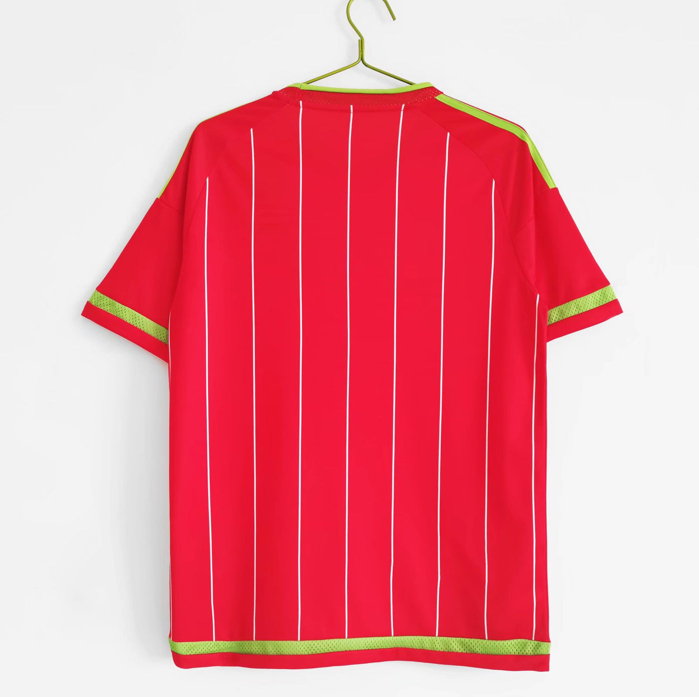 a red shirt hanging on a hanger