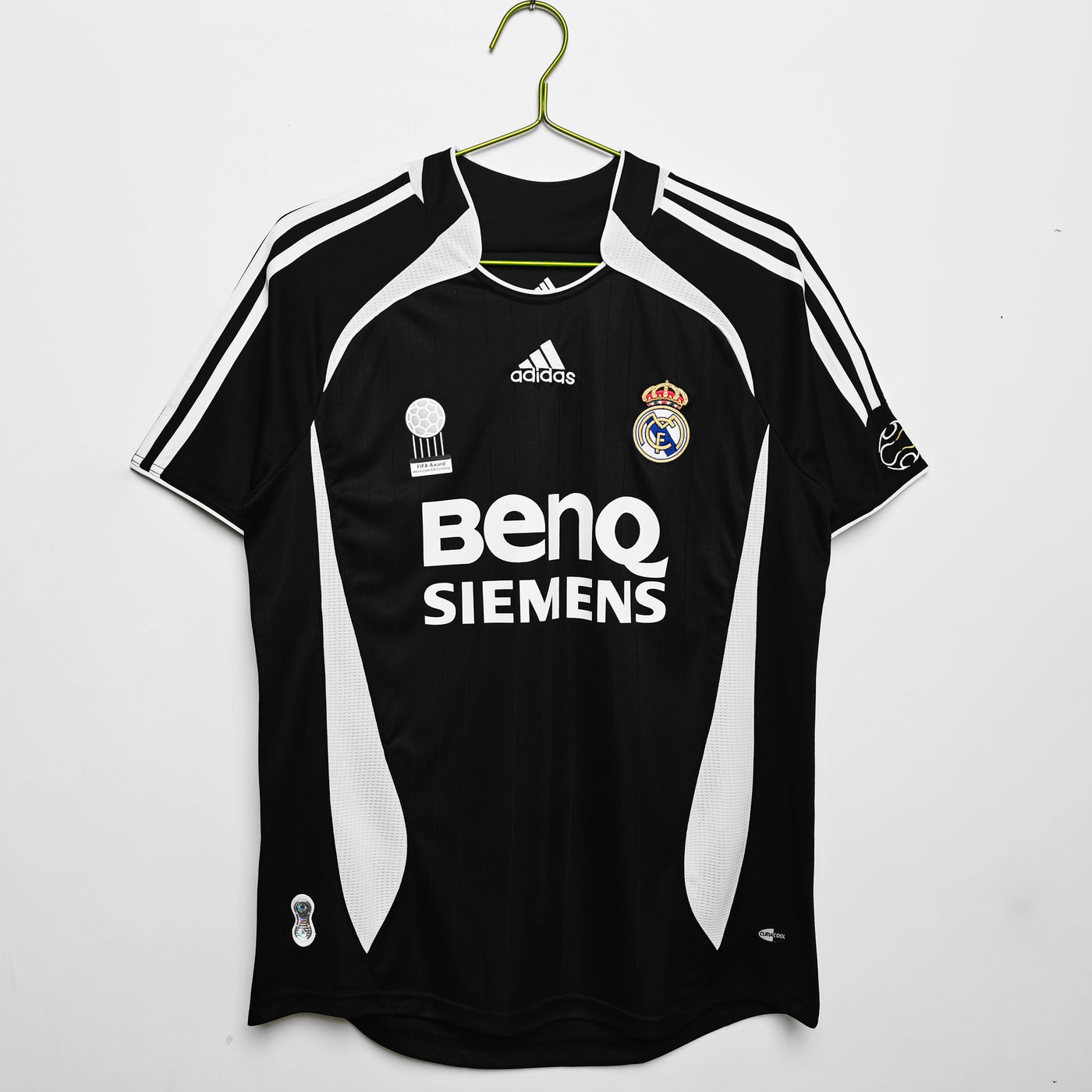 a soccer jersey hanging on a hanger