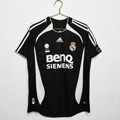 a soccer jersey hanging on a hanger