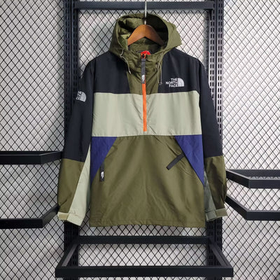 the north face jacket hanging on a rack