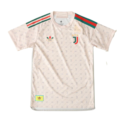 a white t - shirt with a green, red, and white stripe on the