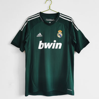 a soccer jersey hanging on a hanger