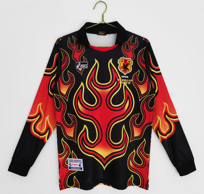 a black and red shirt with flames on it