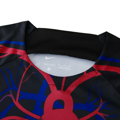 a black shirt with a red and blue design on it