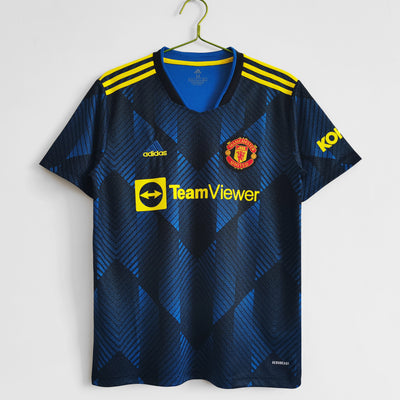 a soccer jersey hanging on a hanger