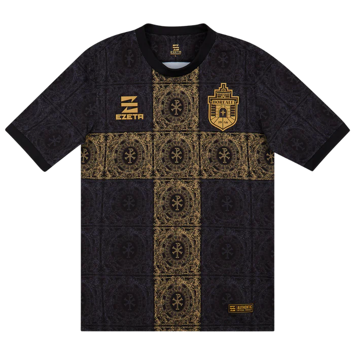 a black and gold shirt with a crest on it