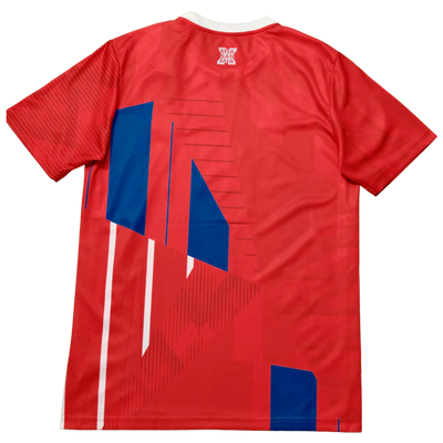 a red shirt with blue and white squares on it