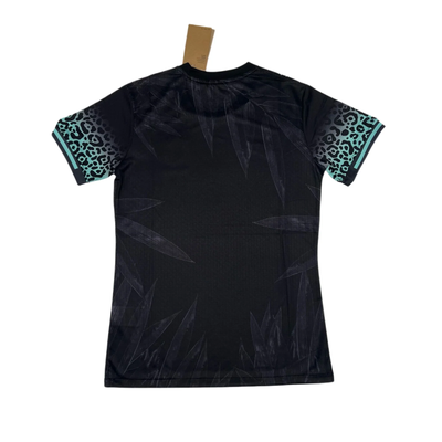 a black t - shirt with a leopard print on it