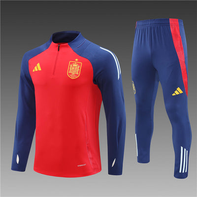 a red and blue soccer jersey and pants