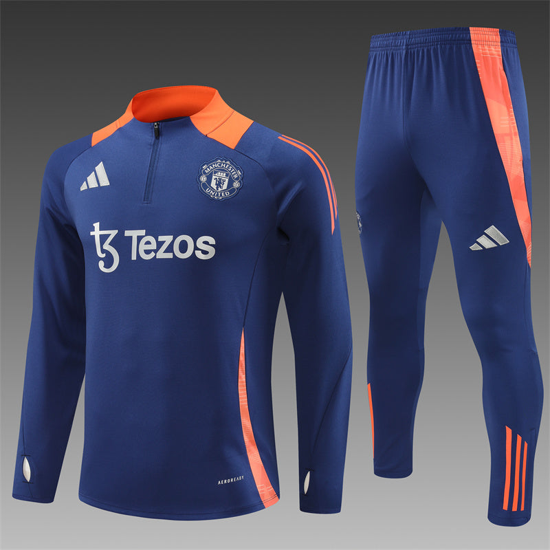 a blue soccer uniform with orange trims