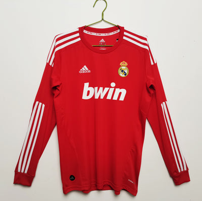 a soccer jersey hanging on a hanger