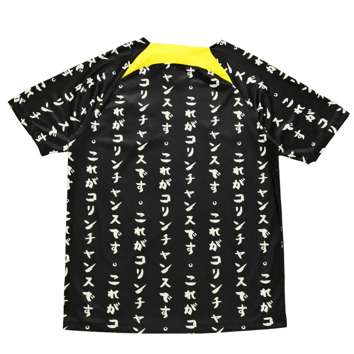 a black and yellow shirt with japanese writing on it