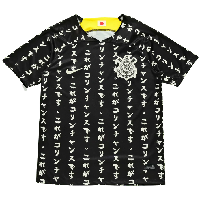 a black and white shirt with japanese writing on it