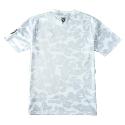 a white t - shirt with a camouflage print