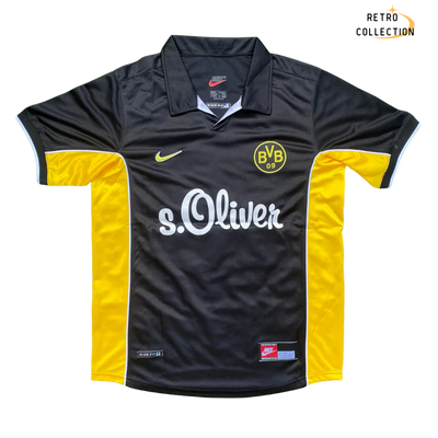 a black and yellow soccer jersey