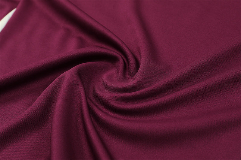 a close up view of a maroon fabric