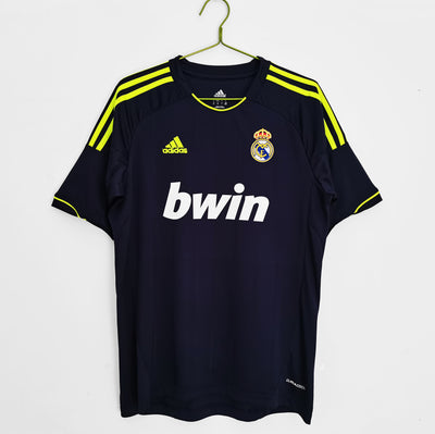 a soccer jersey hanging on a hanger