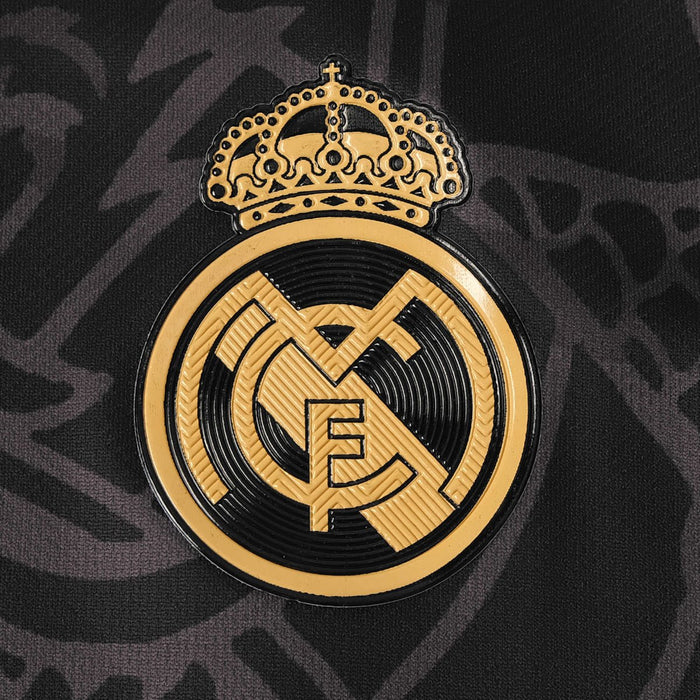 the real madrid crest on a black background