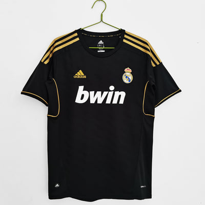 a soccer jersey hanging on a hanger