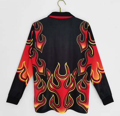 a black and red shirt with flames on it